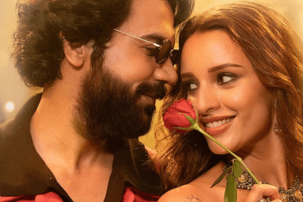 Vicky Vidya Ka Woh Wala Video” Movie Review: A Hilarious Yet Tiring Chase for a Missing Tape a man and woman with a rose