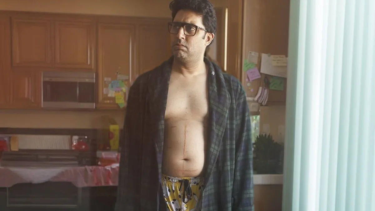 a man with a cut on his stomach